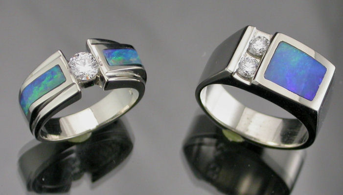 Handcrafted 14K white gold wedding rings with diamonds and opal inlay