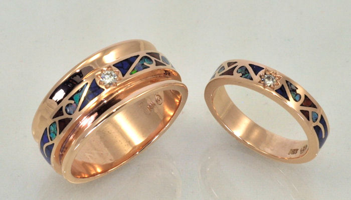 Enlarged view of 14KT rose gold wedding bands with diamonds and gemstone inlay by James Hardwick