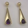 JE43-14kt earrings w/trilliant cut amethyst