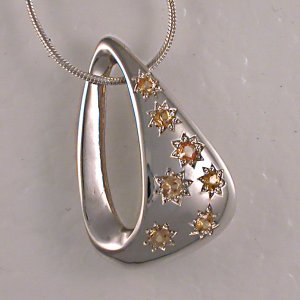 JM36 modified/Silver and yellow sapphires.