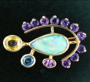 14KT pin with opal, sapphires, amethyst