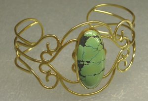 14KT yellow fabricated bracelet with green turquoise cab